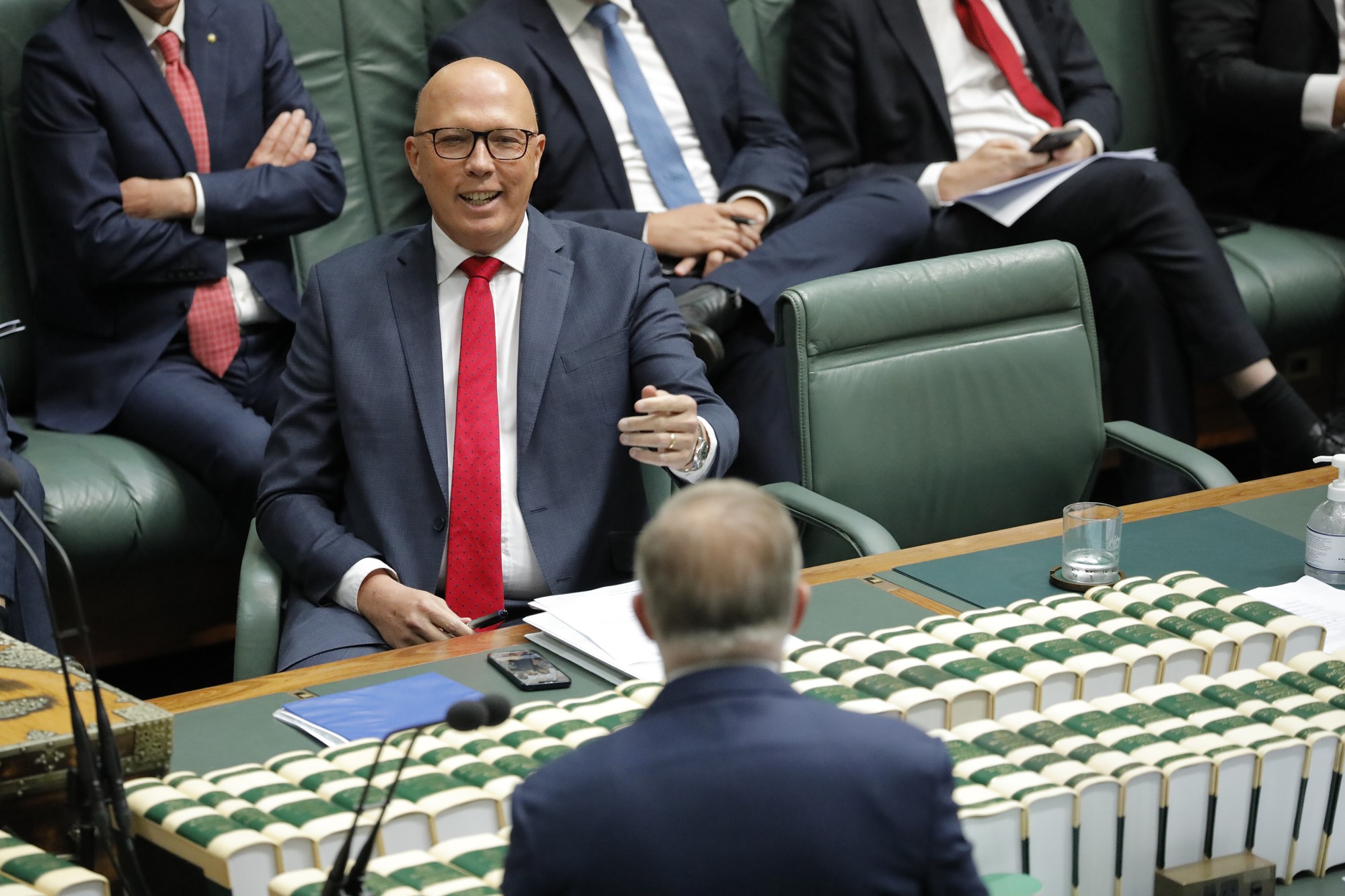 peter dutton gestures at anthony albanese across the table in the house of representatives